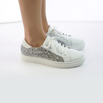 Sneakers da donna in vera pella colore bianco con inserto glitter argento