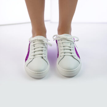 Sneakers da donna in vera pella colore bianco con inserto glitter fucsia elettrico