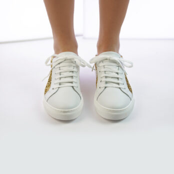 Sneakers da donna in vera pella colore bianco con inserto glitter oro