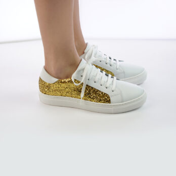 Sneakers da donna in vera pella colore bianco con inserto glitter oro