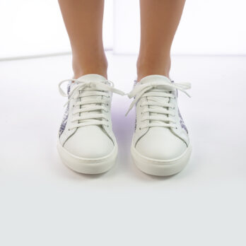 Sneakers da donna in vera pella colore bianco con inserto stampa pitone